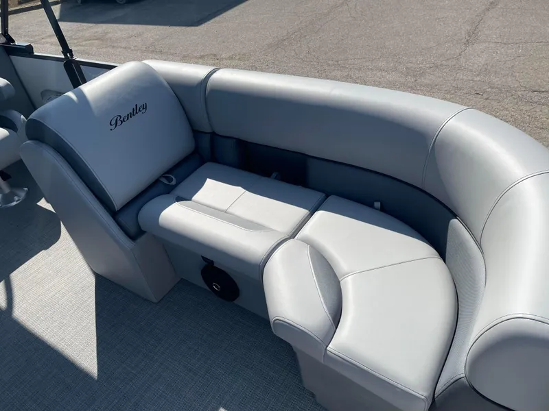 Slide: The Image of 2025 Bentley Pontoons Legacy 203 Navigator, luxurious seating detail, gray upholstery. - 7
