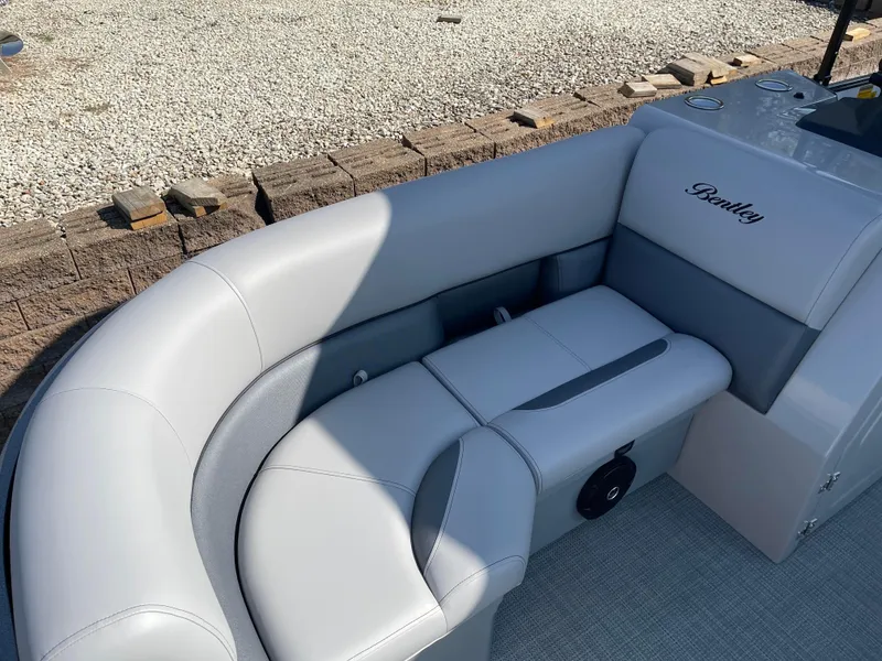 Slide: The Image of 2025 Bentley Pontoons Legacy 203 Navigator, luxurious seating detail, light gray upholstery. - 8