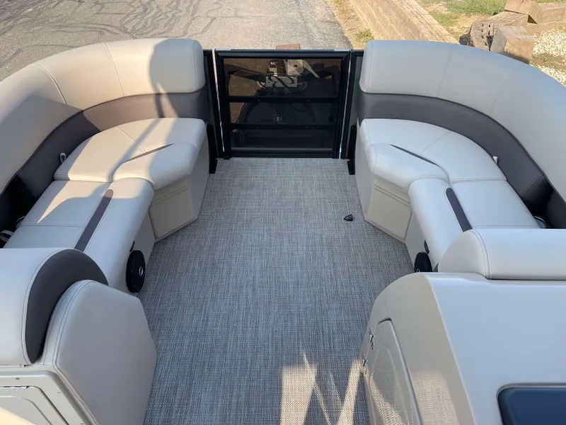Slide: The Image of 2025 Bentley Pontoons Legacy 203 Swingback interior with plush seating and modern design. - 10
