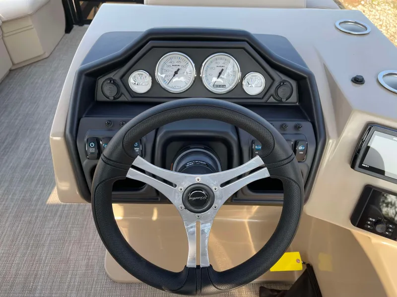 Slide: The Image of Steering wheel and dashboard of 2025 Bentley Pontoons Legacy 203 Swingback boat. - 17