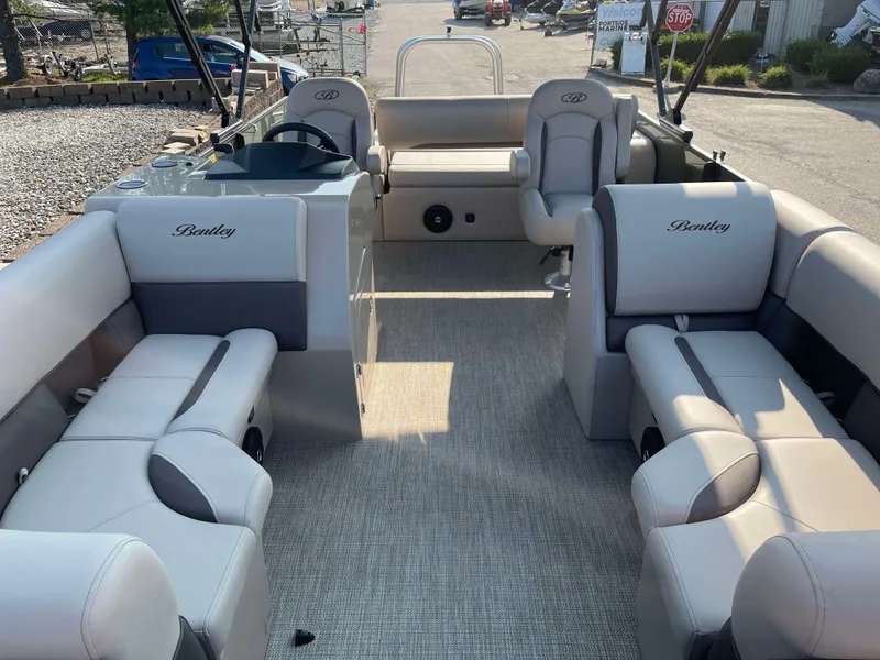 Slide: The Image of 2025 Bentley Pontoons Legacy 203 Swingback interior with luxurious seating and modern design. - 7