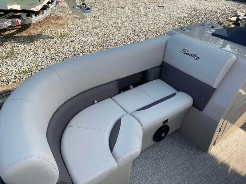 Slide: The Image of 2025 Bentley Pontoons Legacy 203 Swingback interior seating, luxurious gray upholstery. - 8