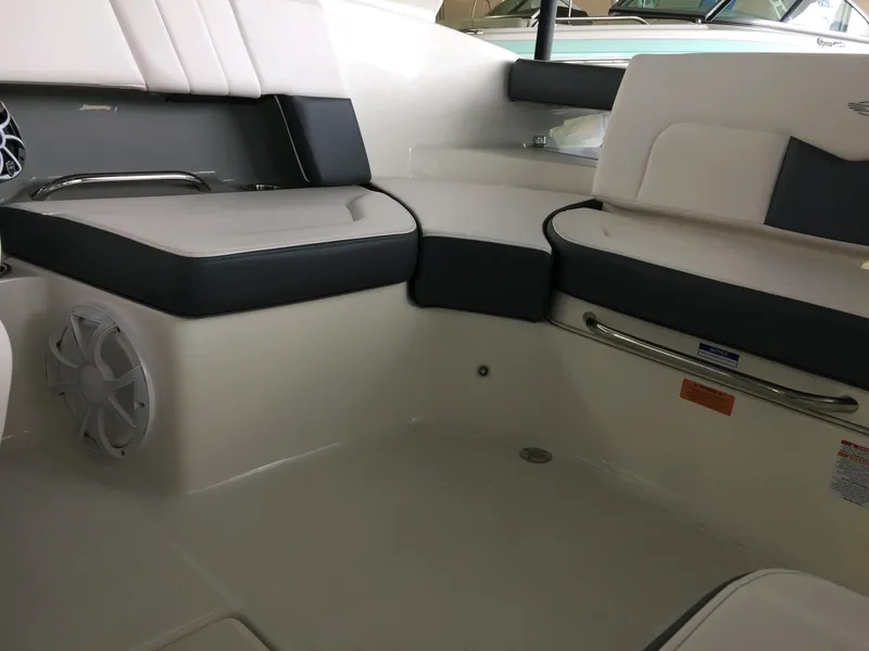 Slide: The Image of Interior seating of 2019 Chaparral 237 SSX boat with speaker and handrail. - 10