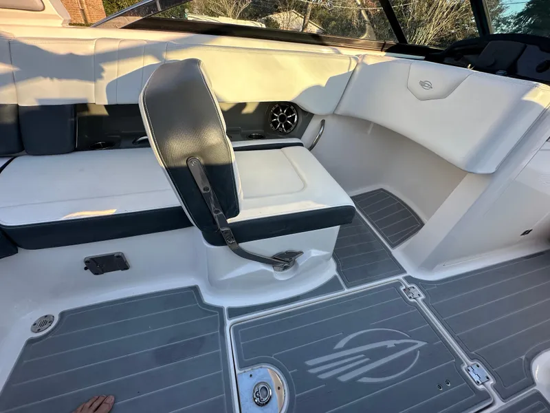 Slide: The Image of 2019 Chaparral 237 SSX boat interior with seating and flooring details. - 17