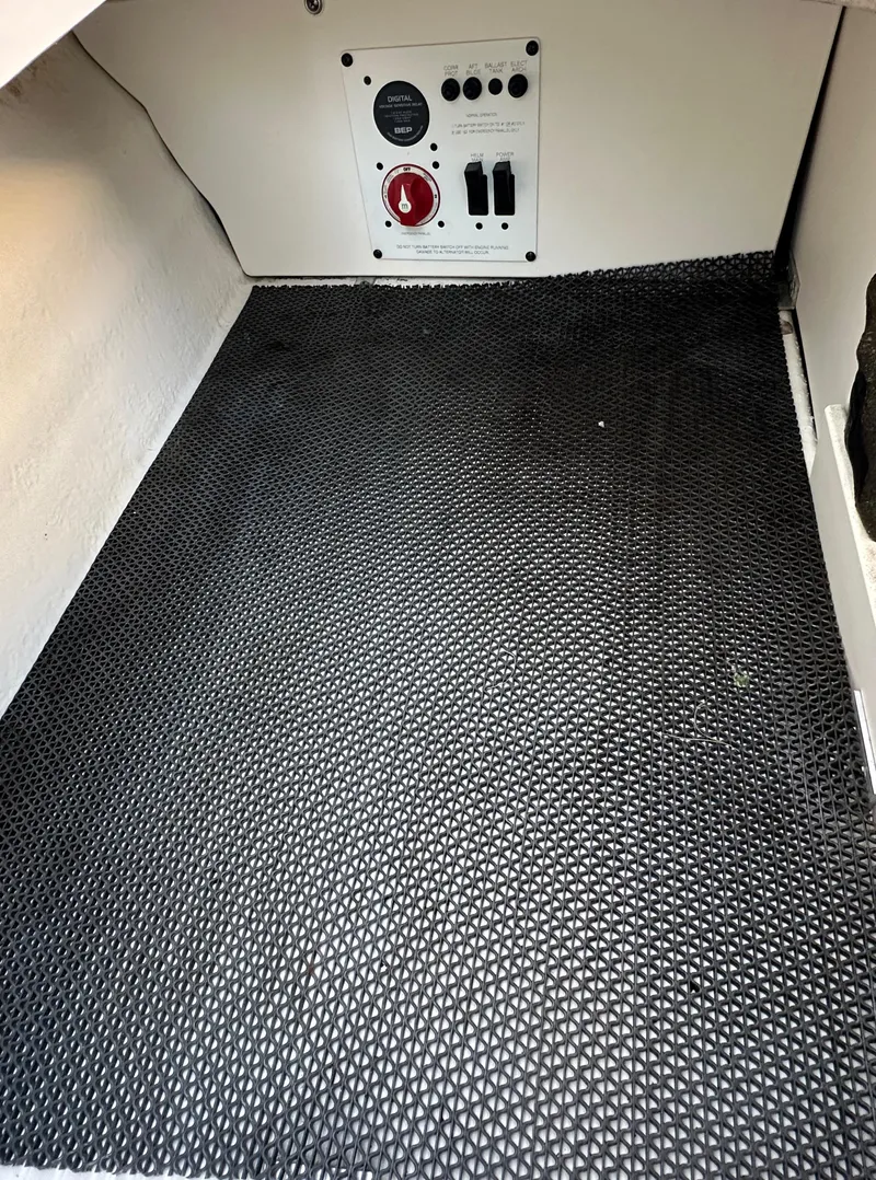 Slide: The Image of 2019 Chaparral 237 SSX interior with control panel and textured flooring. - 24