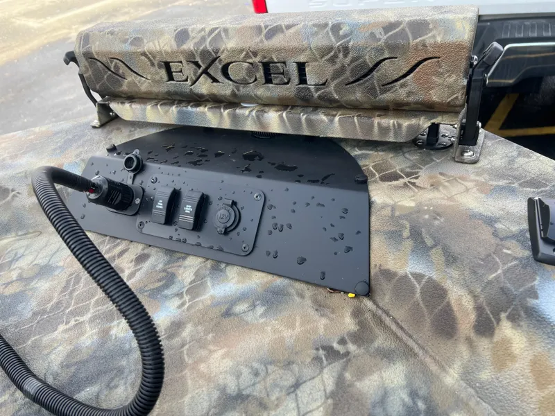 Slide: The Image of Control panel of Excel 2072 Stalker SC boat, 2025 model, with camouflage design. - 11