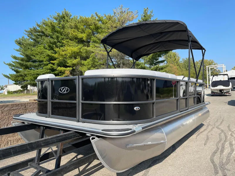 Slide: The Image of 2024 Bentley Pontoons LE 20 CW pontoon boat with canopy on trailer. - 0