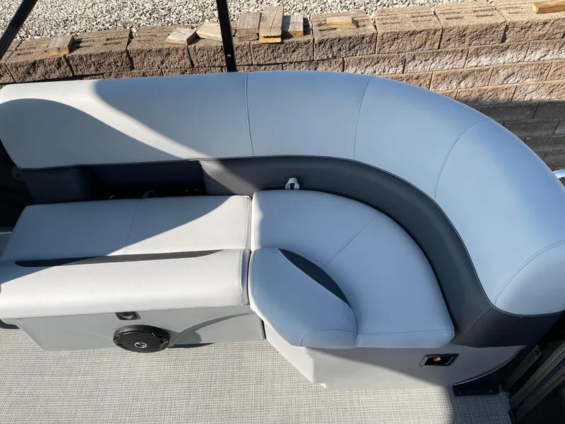 Slide: The Image of 2024 Bentley Pontoons LE 20 CW interior seating, featuring sleek gray upholstery. - 17