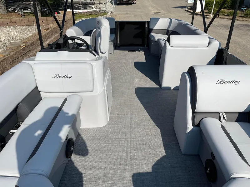 Slide: The Image of 2024 Bentley Pontoons LE 20 CW interior with luxurious seating and modern design. - 7