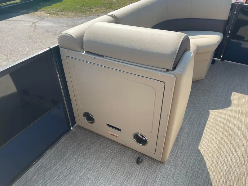 Slide: The Image of 2024 Bentley Pontoons Legacy 200 Navigator interior seating with beige upholstery. - 11