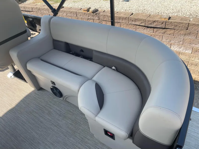 Slide: The Image of 2024 Bentley Pontoons Legacy 200 Navigator interior seating, featuring luxurious gray upholstery. - 23