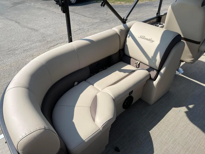Slide: The Image of 2024 Bentley Pontoons Legacy 200 Navigator, luxurious beige seating detail. - 23