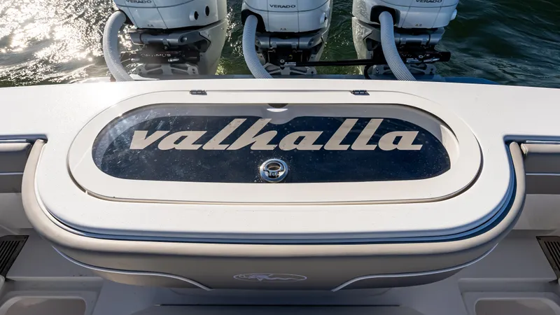 Slide: The Image of 2025 Valhalla Boatworks V-37 with triple outboard engines, rear view. - 12