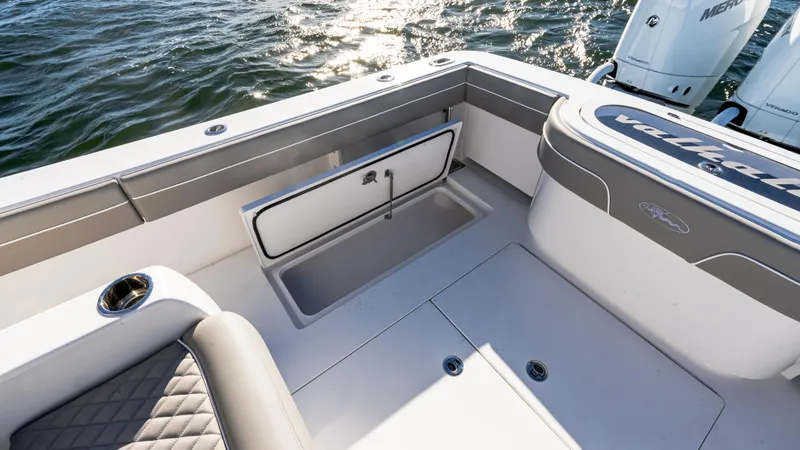 Slide: The Image of 2025 Valhalla Boatworks V-37 deck with storage compartment and seating. - 16