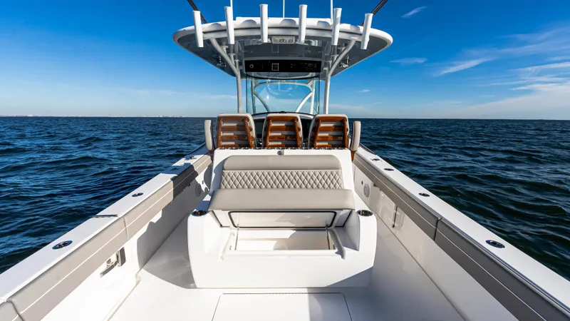 Slide: The Image of 2025 Valhalla Boatworks V-37 on open water, showcasing sleek design and seating. - 18