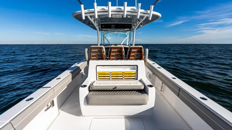Slide: The Image of 2025 Valhalla Boatworks V-37 on open water, showcasing sleek design and spacious deck. - 20