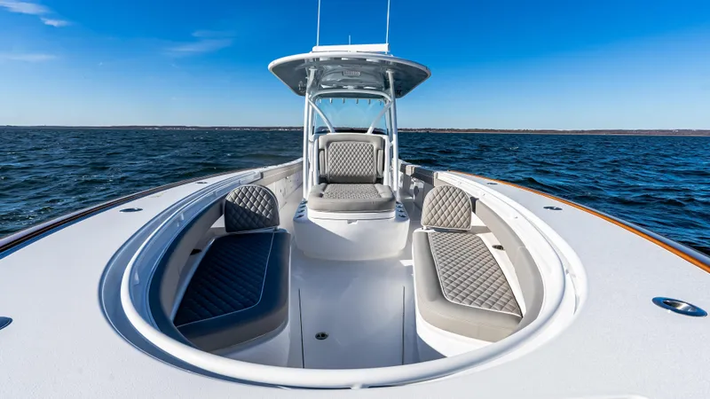 Slide: The Image of 2025 Valhalla Boatworks V-37 on open water, showcasing sleek design and seating. - 40