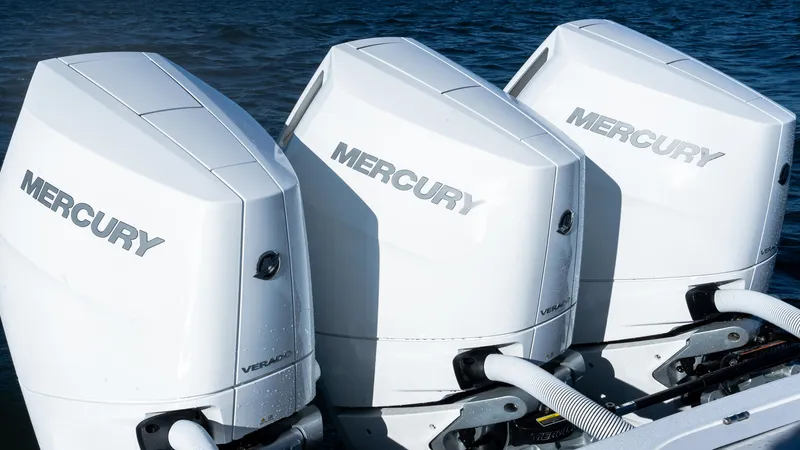Slide: The Image of Three Mercury outboard engines on a 2025 Valhalla Boatworks V-37. - 8