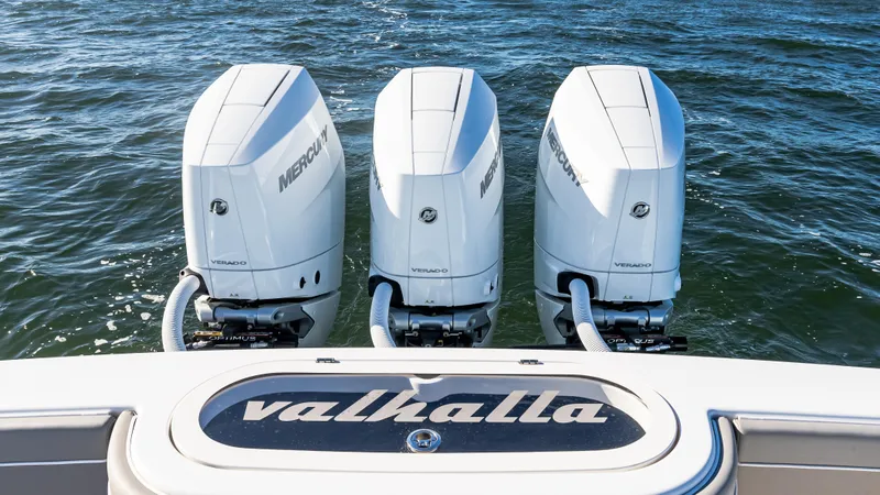 Slide: The Image of 2025 Valhalla Boatworks V-37 with triple Mercury outboard engines on water. - 9