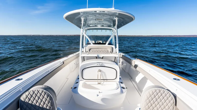 Slide: The Image of 2025 Valhalla Boatworks V-37 on open water, showcasing sleek design and spacious deck. - 32