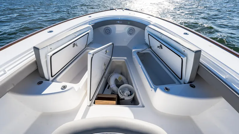 Slide: The Image of 2025 Valhalla Boatworks V-37 bow storage compartments on open water. - 34
