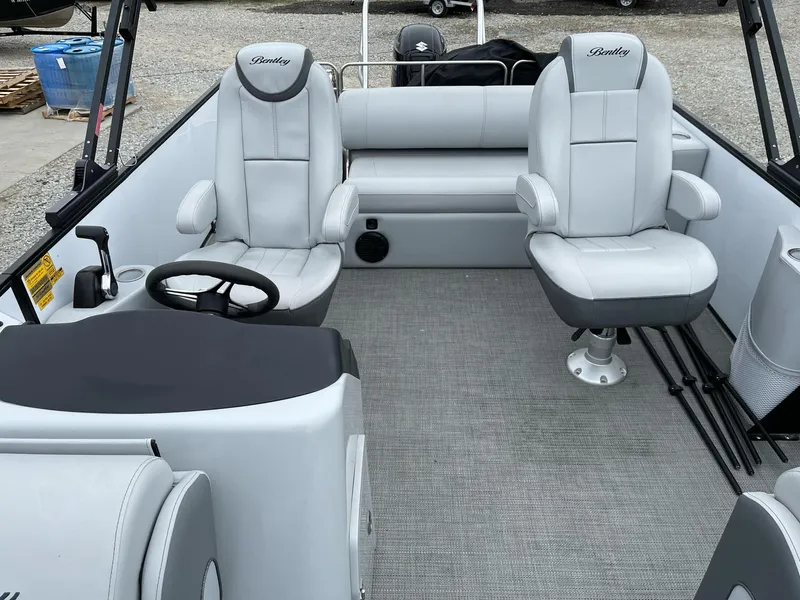 Slide: The Image of 2022 Bentley Pontoons Elite 223 Swingback interior with plush seating and modern design. - 12