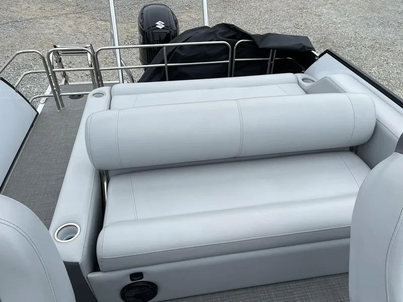 Slide: The Image of 2022 Bentley Pontoons Elite 223 Swingback with gray seating and cup holders. - 21