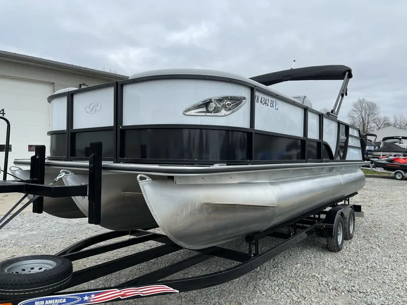 Slide: The Image of 2022 Bentley Pontoons Elite 223 Swingback on trailer, parked outdoors. - 7