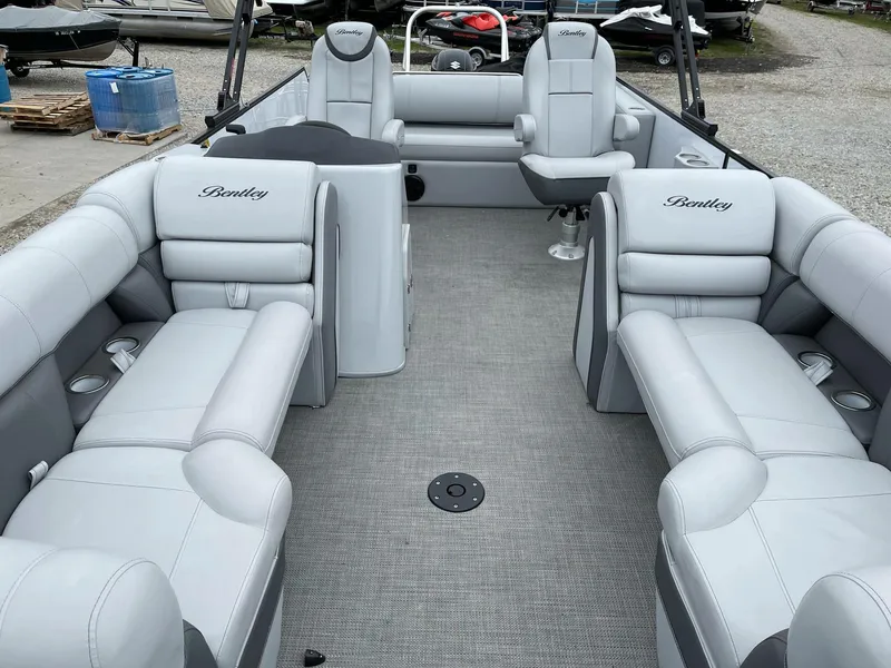 Slide: The Image of 2022 Bentley Pontoons Elite 223 Swingback with luxurious seating and spacious interior. - 9