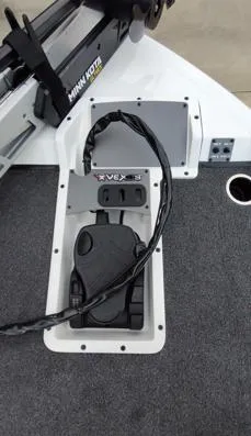 Slide: The Image of 2025 Vexus AVX1880 boat deck with Minn Kota trolling motor and foot pedal. - 4