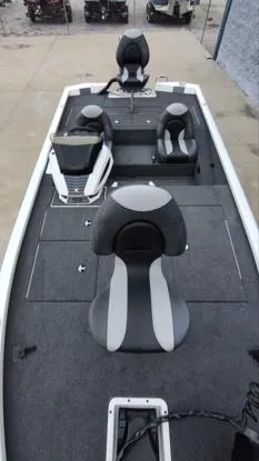 Slide: The Image of 2025 Vexus AVX1880 fishing boat interior with seating and console. - 9