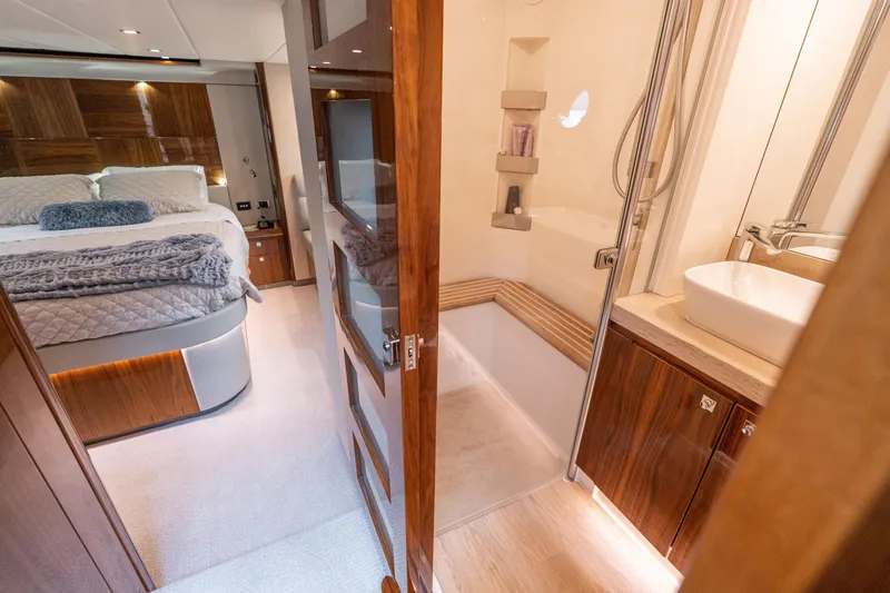 Slide: The Image of Luxurious interior of 2017 Riviera 6000 Sport Yacht with bedroom and bathroom. - 35