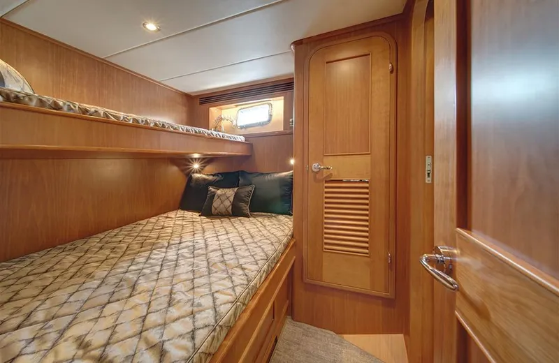 Slide: The Image of Luxurious cabin interior of 2020 Outer Reef Yachts 720 Deluxbridge Motoryacht, featuring cozy bedding. - 19