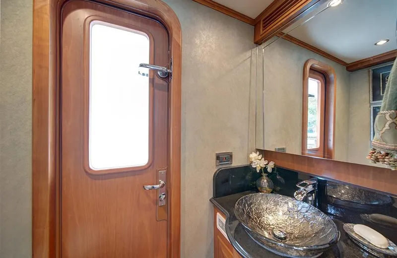 Slide: The Image of Luxurious bathroom in 2020 Outer Reef Yachts 720 Deluxbridge Motoryacht with elegant glass sink. - 5