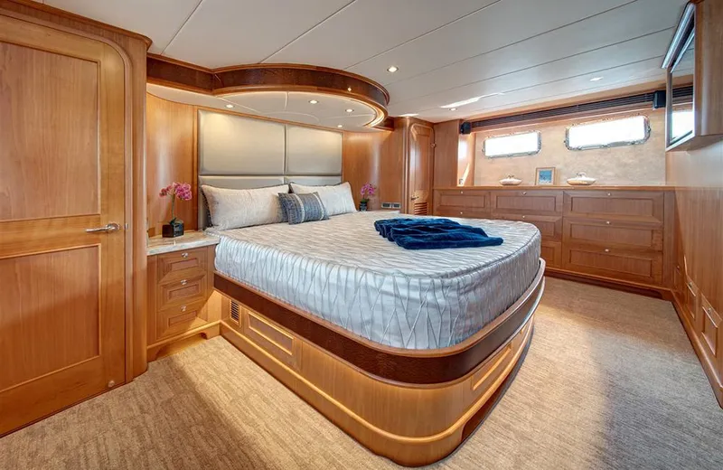 Slide: The Image of Luxurious bedroom in 2020 Outer Reef Yachts 720 Deluxbridge Motoryacht, featuring elegant wood finishes. - 22