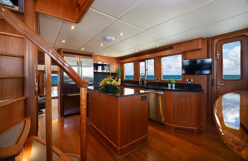 Slide: The Image of Luxurious interior of 2020 Outer Reef Yachts 720 Deluxbridge Motoryacht with modern kitchen amenities. - 8