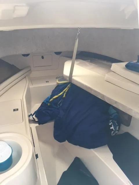 Slide: The Image of Interior cabin of 2004 Grady-White 232 Gulfstream boat with seating and storage. - 9
