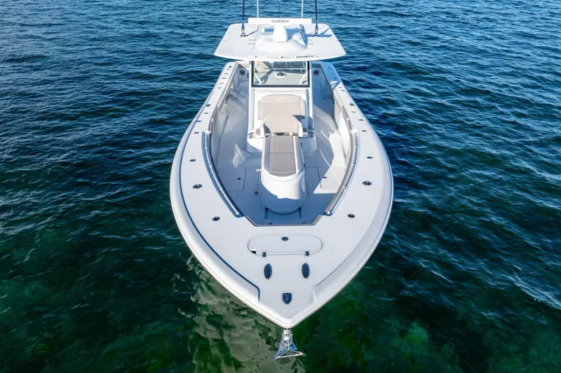 Slide: The Image of 2024 Yellowfin 39 boat on clear blue water, aerial view. - 10