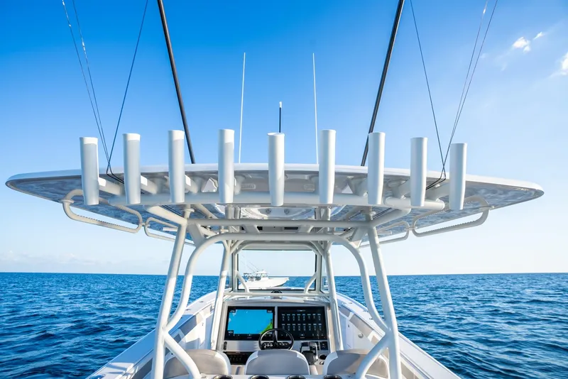 Slide: The Image of 2024 Yellowfin 39 boat on open sea with clear blue sky. - 16