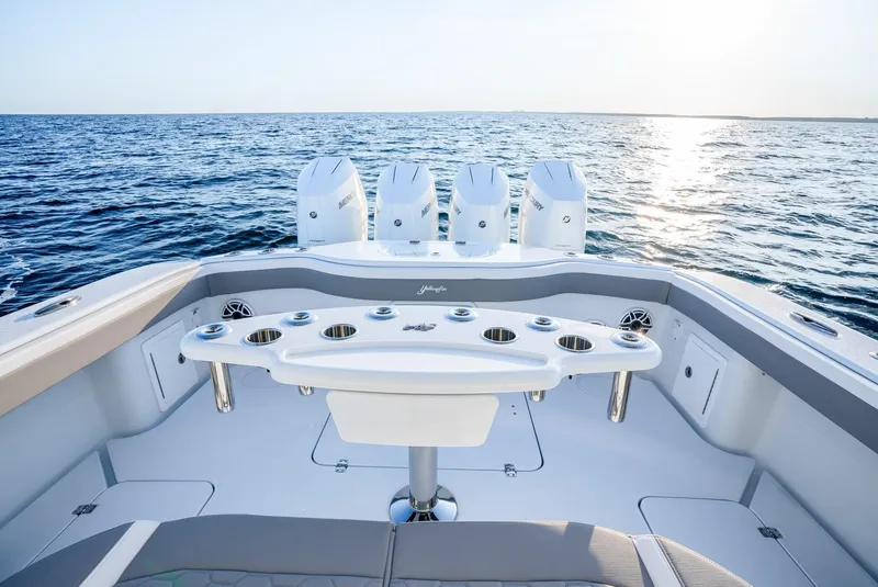 Slide: The Image of 2024 Yellowfin 39 boat with quad engines on open sea. - 20