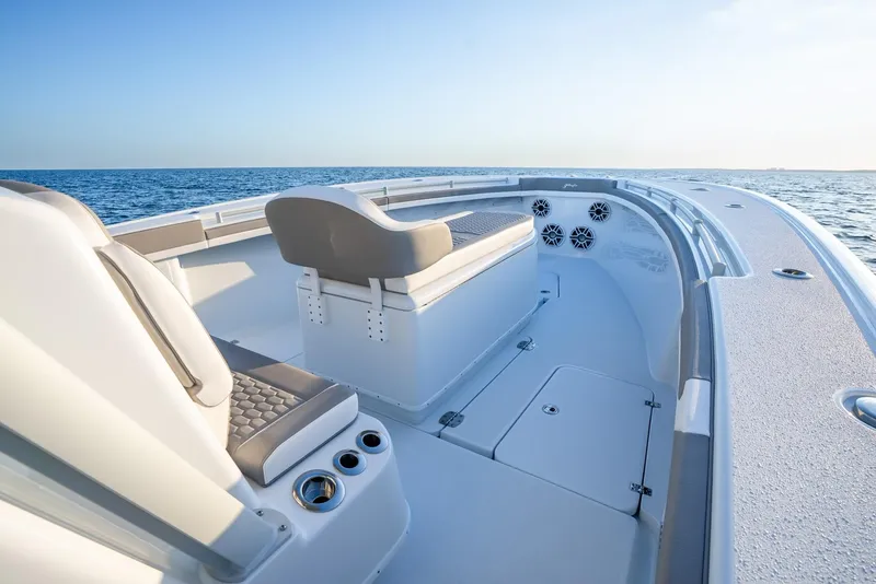 Slide: The Image of 2024 Yellowfin 39 boat interior with seating, ocean view, and modern design. - 26