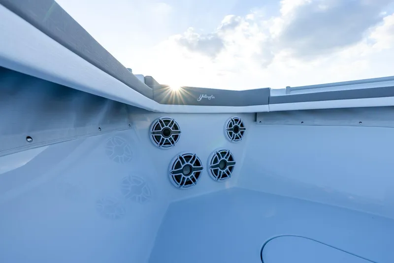 Slide: The Image of 2024 Yellowfin 39 boat interior with speakers and sunlight. - 33
