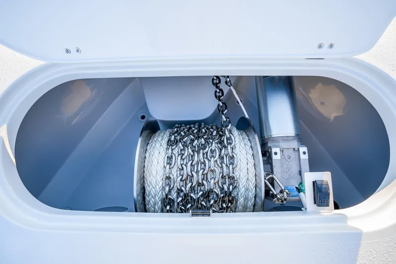 Slide: The Image of 2024 Yellowfin 39 anchor chain compartment with winch system. - 35
