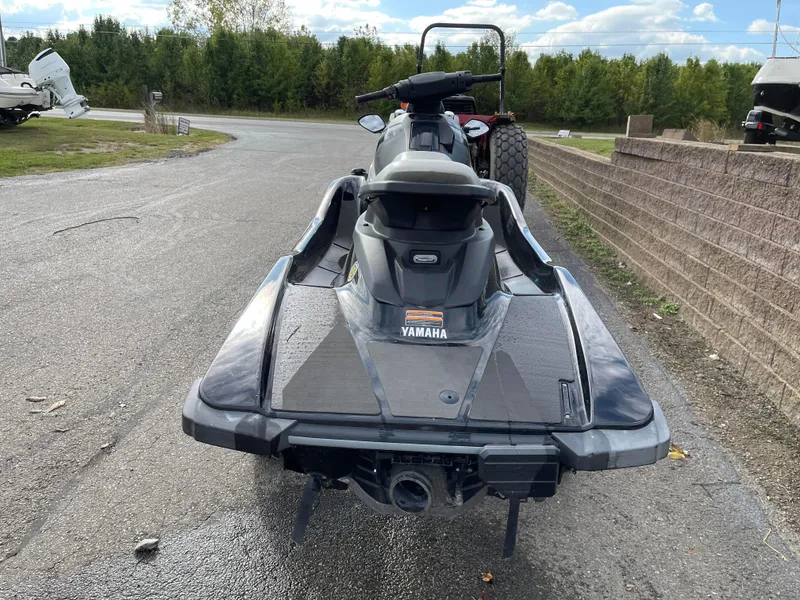 Slide: The Image of 2017 Yamaha WaveRunner EX Sport jet ski parked on a paved road. - 4