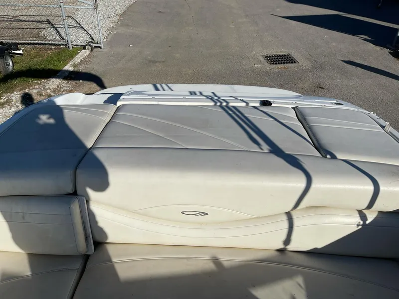 Slide: The Image of 2007 Maxum 1900 SR-3 boat interior with beige seating and shadow. - 9