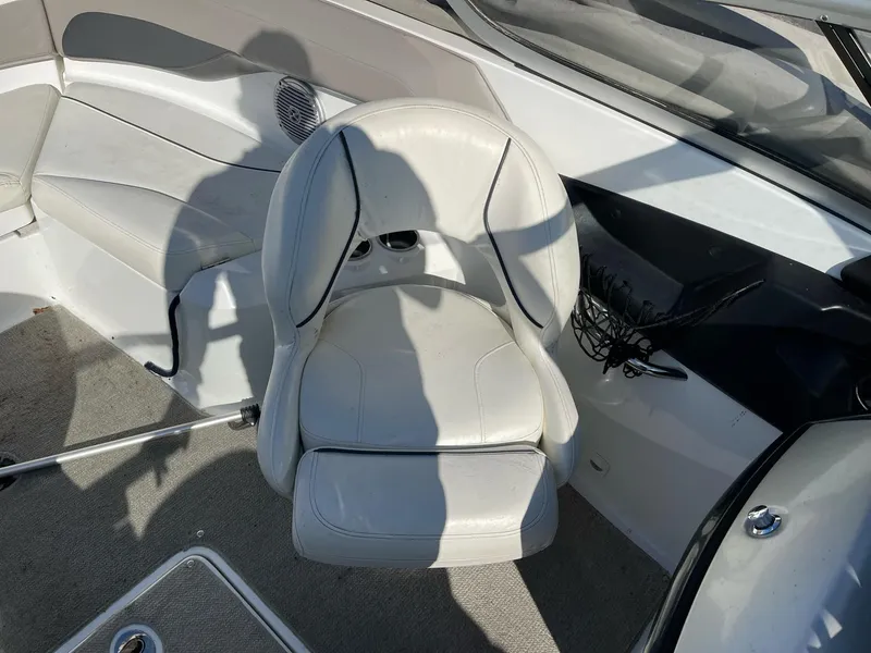 Slide: The Image of 2010 Sea-Doo 210 Challenger interior with white leather seating and modern design. - 14