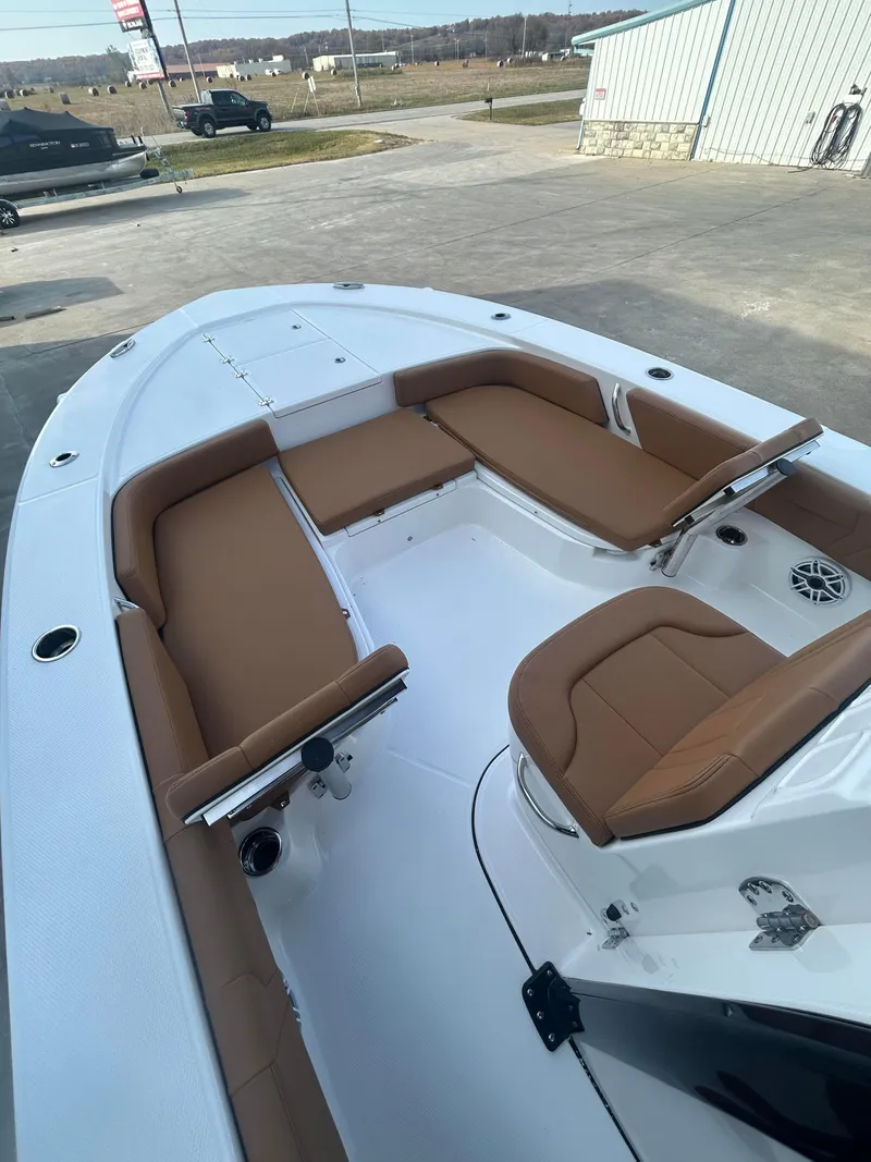 Slide: The Image of 2025 Robalo 246 Cayman boat with spacious seating and modern design. - 9