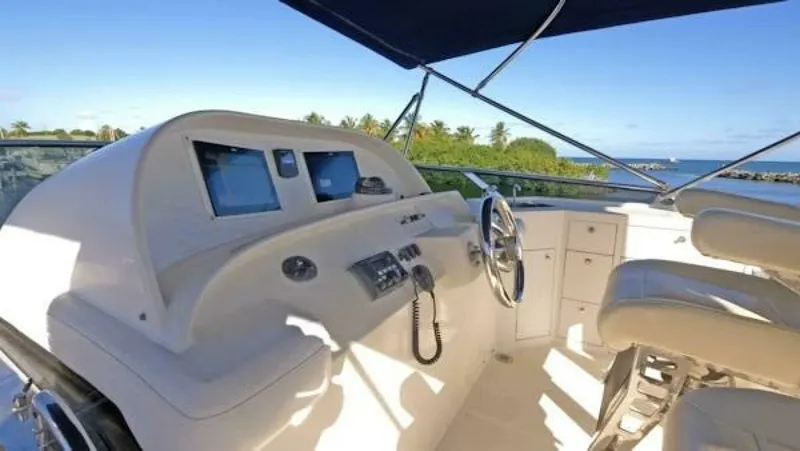 Slide: The Image of 2004 McKinna Pilothouse yacht helm with dual screens and ocean view. - 11