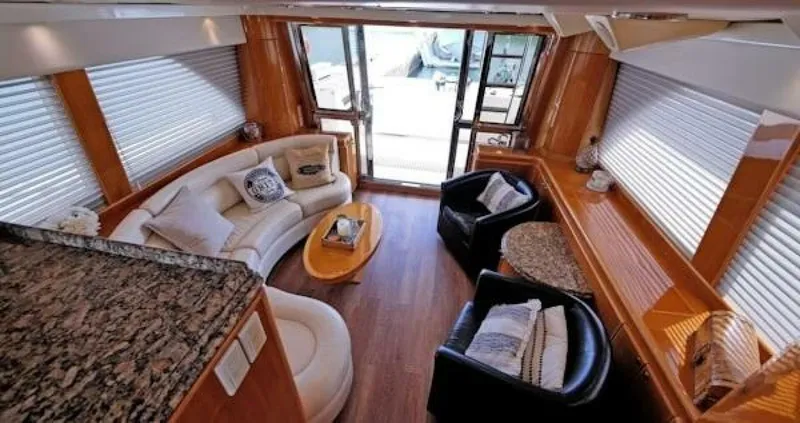 Slide: The Image of Luxurious 2004 McKinna Pilothouse interior with elegant seating and stylish decor. - 18