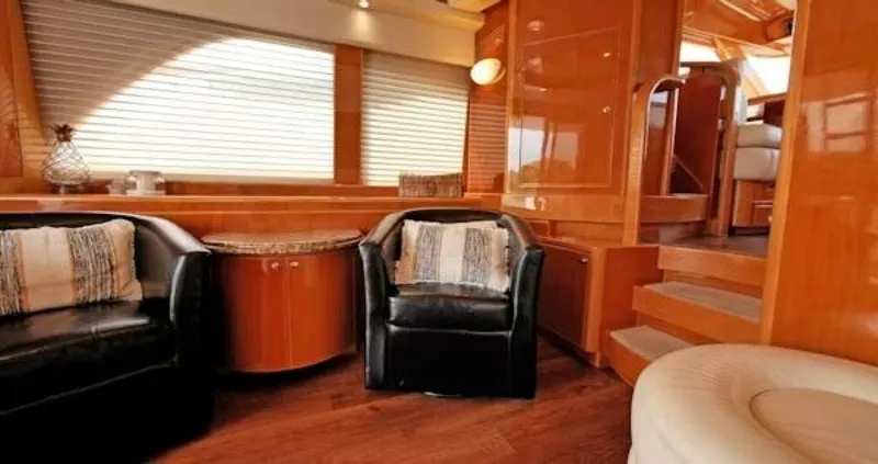 Slide: The Image of Luxurious 2004 McKinna Pilothouse interior with elegant seating and wooden finishes. - 19